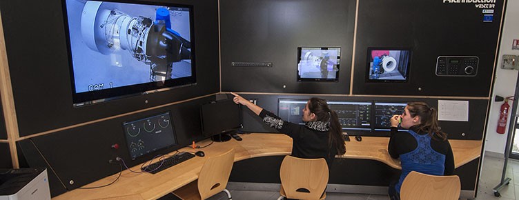 Students working in a simulator