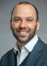 Headshot of Professor Patrick Ray