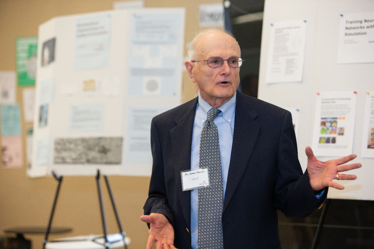 Summer Protégé Engineering students showcase their work at a poster session.